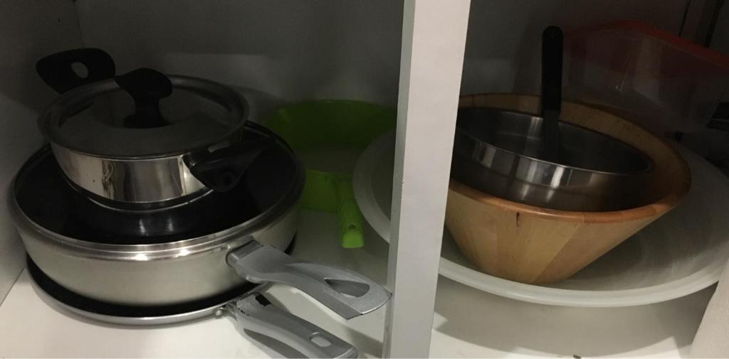a pot and a mixer and a wooden bowl at Catalans in Marseille