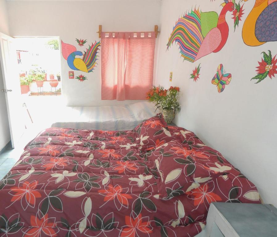 Letto o letti in una camera di Posada Joan Sebastian