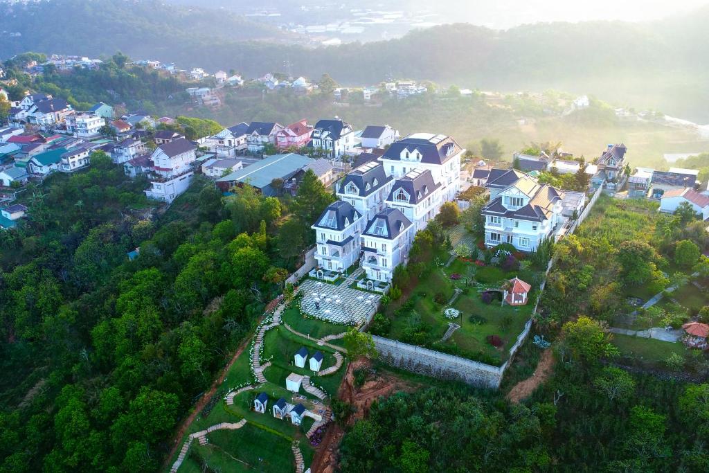 an aerial view of a large house on a hill at Dalat De Charme Village in Da Lat