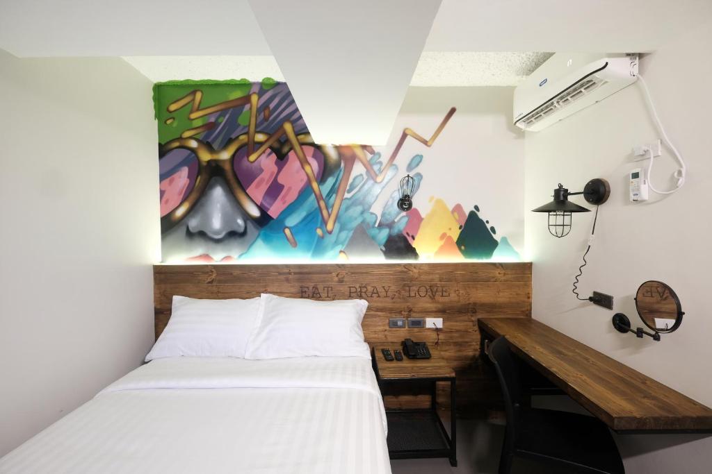 Postel nebo postele na pokoji v ubytování U Hotels Makati