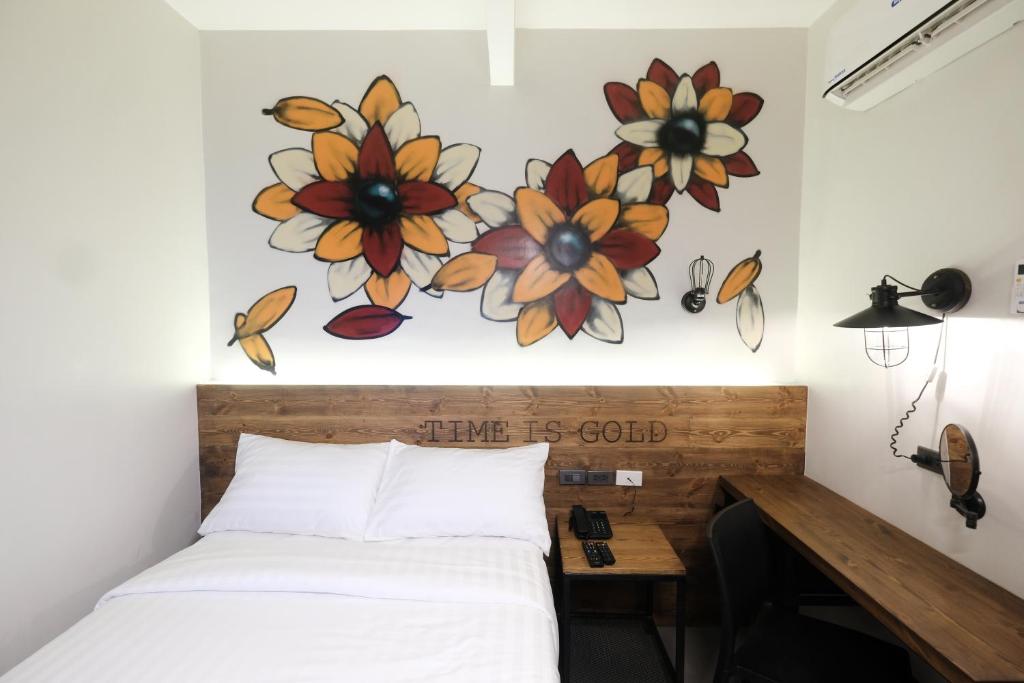 Postel nebo postele na pokoji v ubytování U Hotels Makati