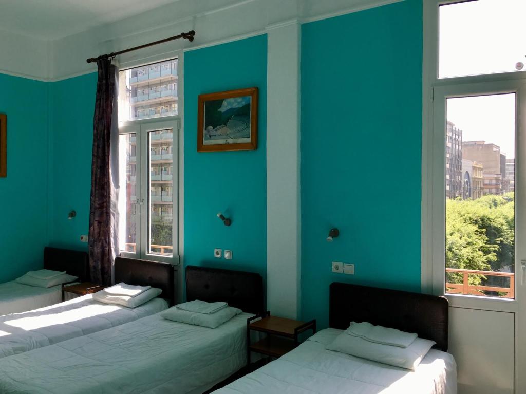 Postel nebo postele na pokoji v ubytování Hotel Kastoria