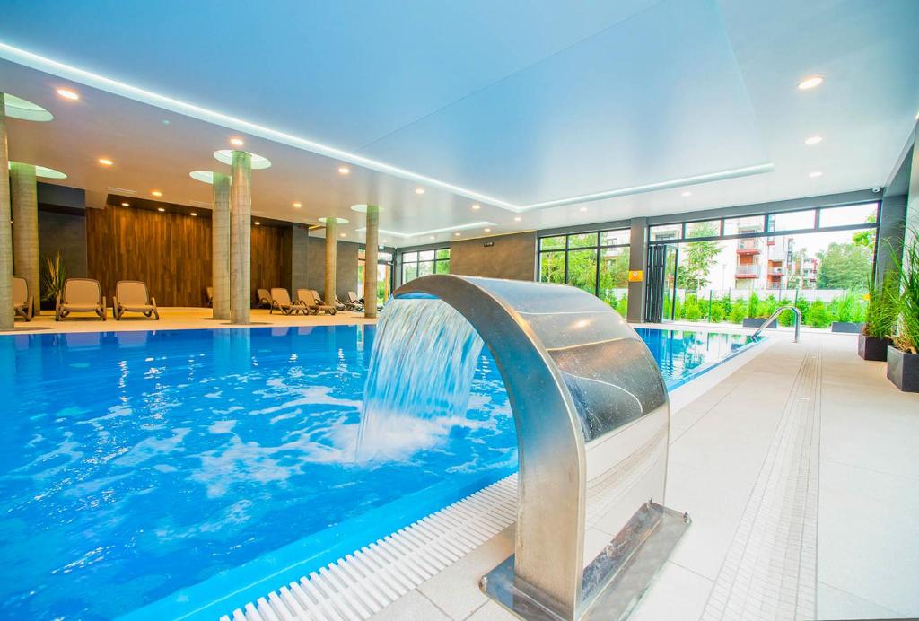 Bazén v ubytovaní Aqua Holiday Apartments Beach#Pool#Sauna no limit alebo v jeho blízkosti