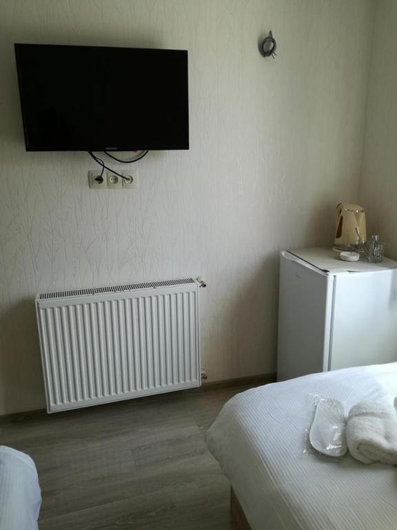 Postel nebo postele na pokoji v ubytování Guest House Imereti