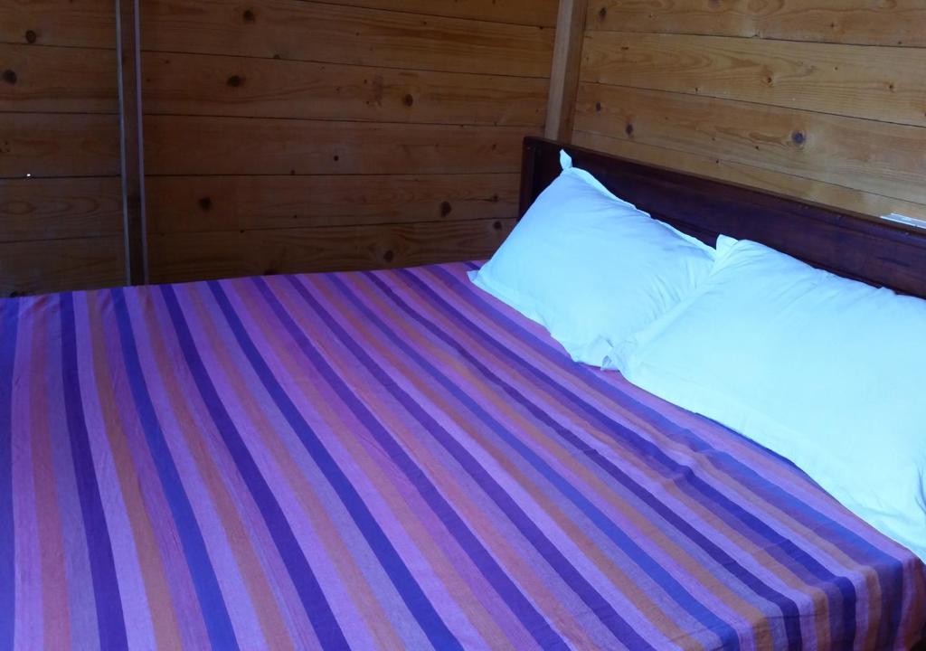 Postel nebo postele na pokoji v ubytování Ceylon Antheia Beach Resort