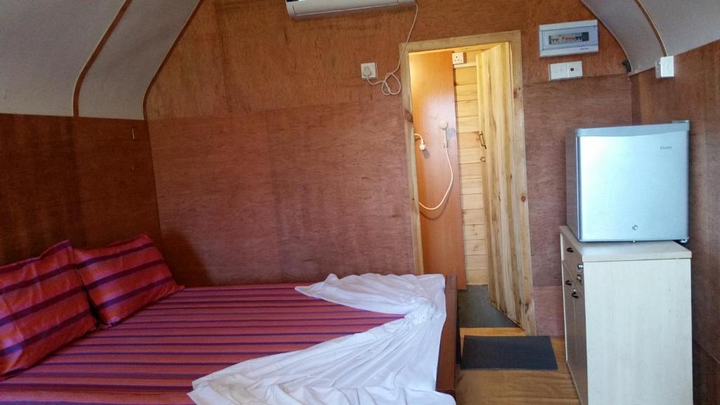Postel nebo postele na pokoji v ubytování Ceylon Antheia Beach Resort