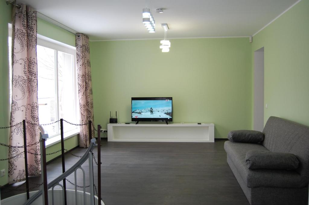 TV a/nebo společenská místnost v ubytování Kaunis Guesthouse