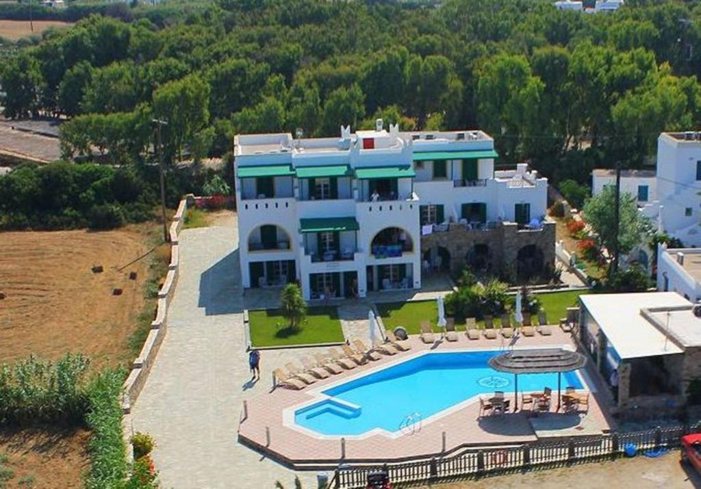 an aerial view of a large house with a swimming pool at Villa Harmony in Agia Anna Naxos