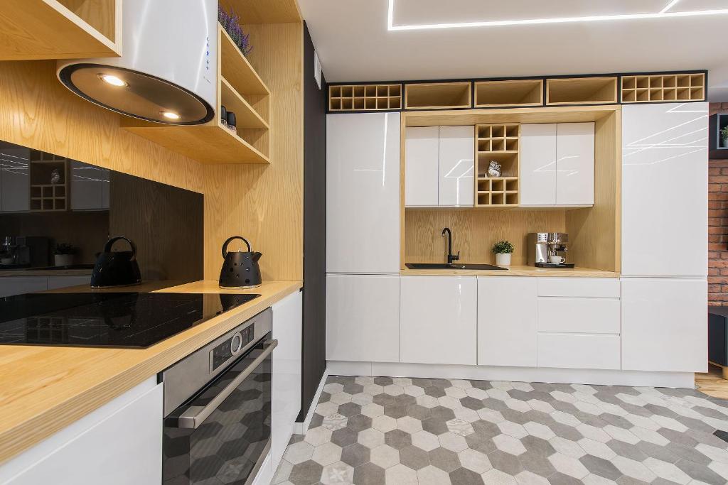 Kuchyňa alebo kuchynka v ubytovaní P&O Serviced Apartments MORDOR