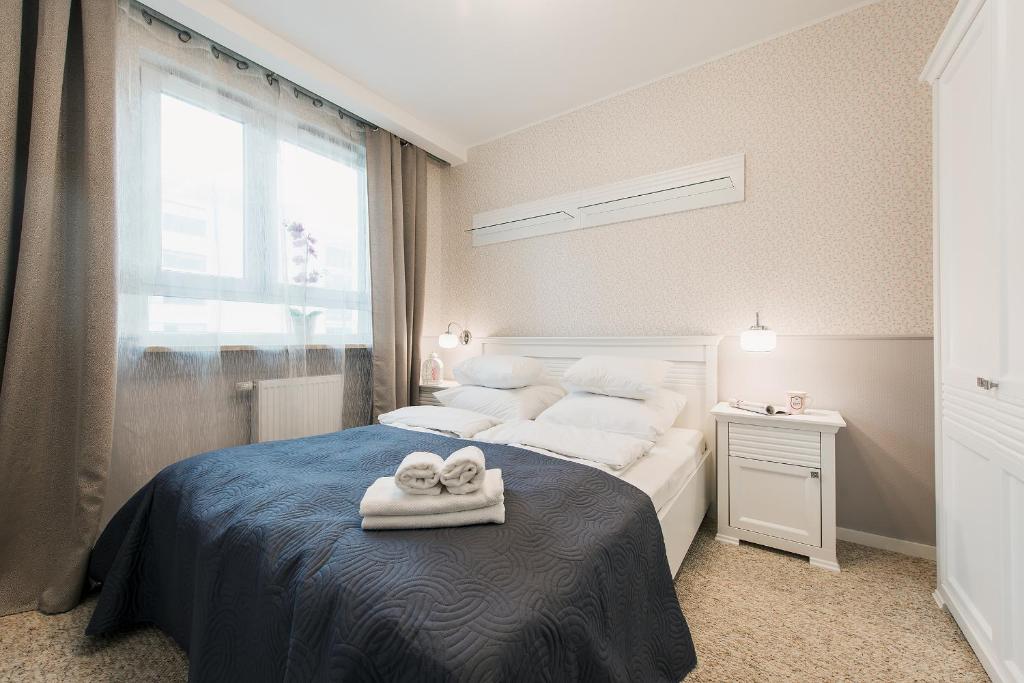 Posteľ alebo postele v izbe v ubytovaní P&O Serviced Apartments MORDOR