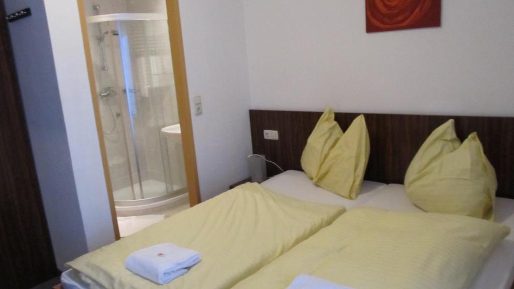 Postel nebo postele na pokoji v ubytování Park Hotel Gastein alle Getränke ganztags inklusive