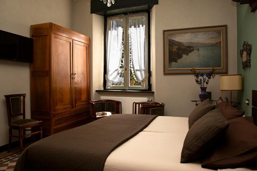 Postel nebo postele na pokoji v ubytování Villa Ucci