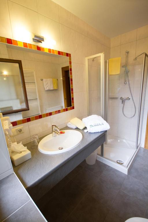 Koupelna v ubytování Hotel Garni Sonnblick