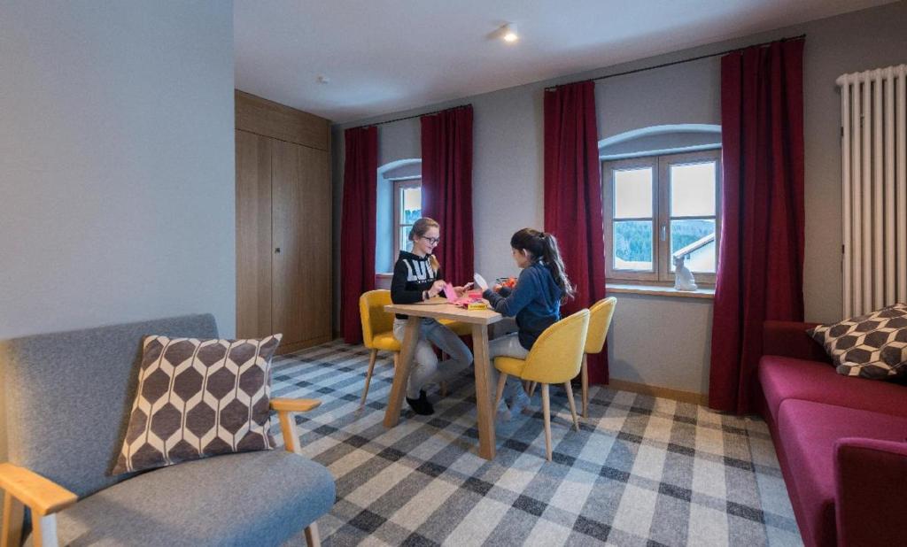 Posezení v ubytování Gasthaus - Hotel FUCHS