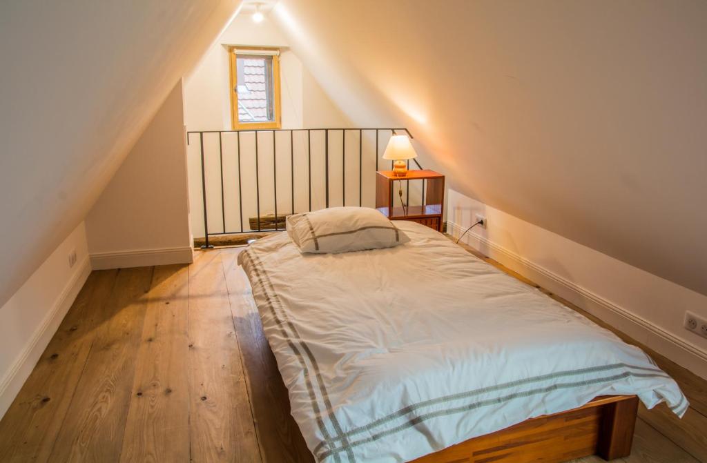 Postel nebo postele na pokoji v ubytování Unter der Linde
