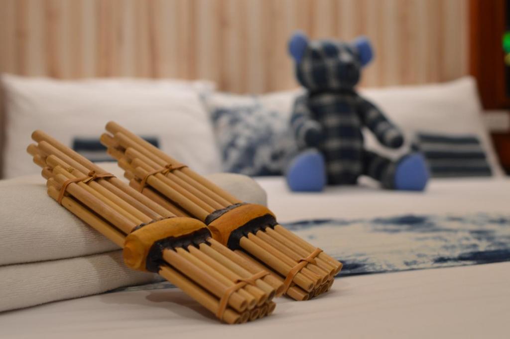 Postel nebo postele na pokoji v ubytování UD Capital Hotel