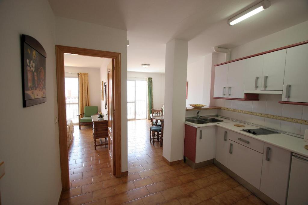 Una cocina o zona de cocina en Apartamentos Casanova