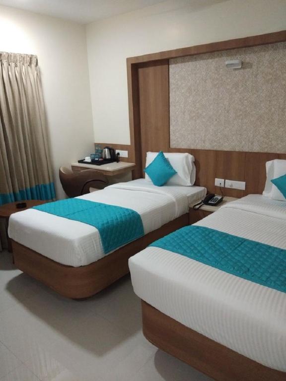 Postel nebo postele na pokoji v ubytování Hotel iStay