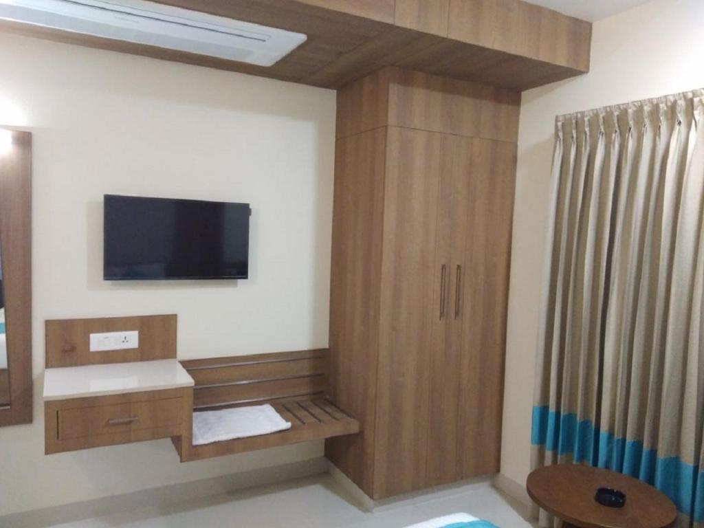 TV a/nebo společenská místnost v ubytování Hotel iStay