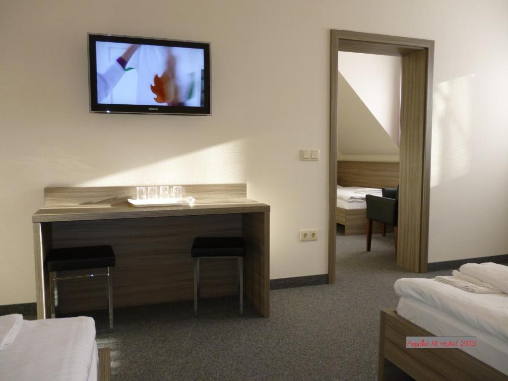 Postel nebo postele na pokoji v ubytování Paprika M1 Hotel