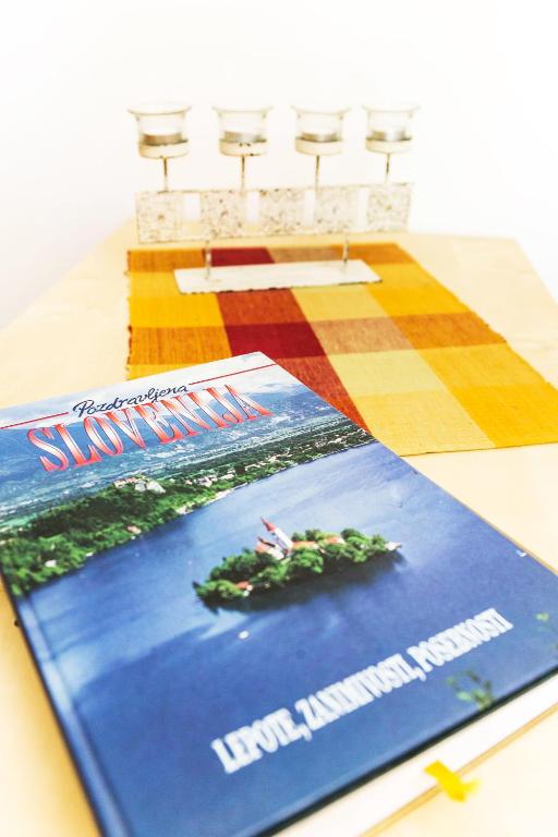a magazine sitting on top of a table at Apartments Baredi in Izola