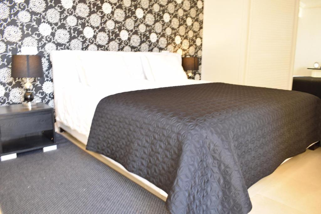 Postel nebo postele na pokoji v ubytování Penthouse Montaña