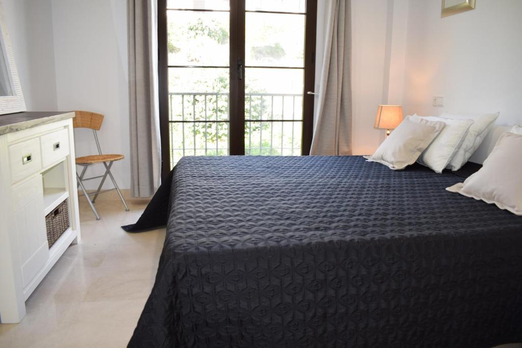 Postel nebo postele na pokoji v ubytování Penthouse Montaña