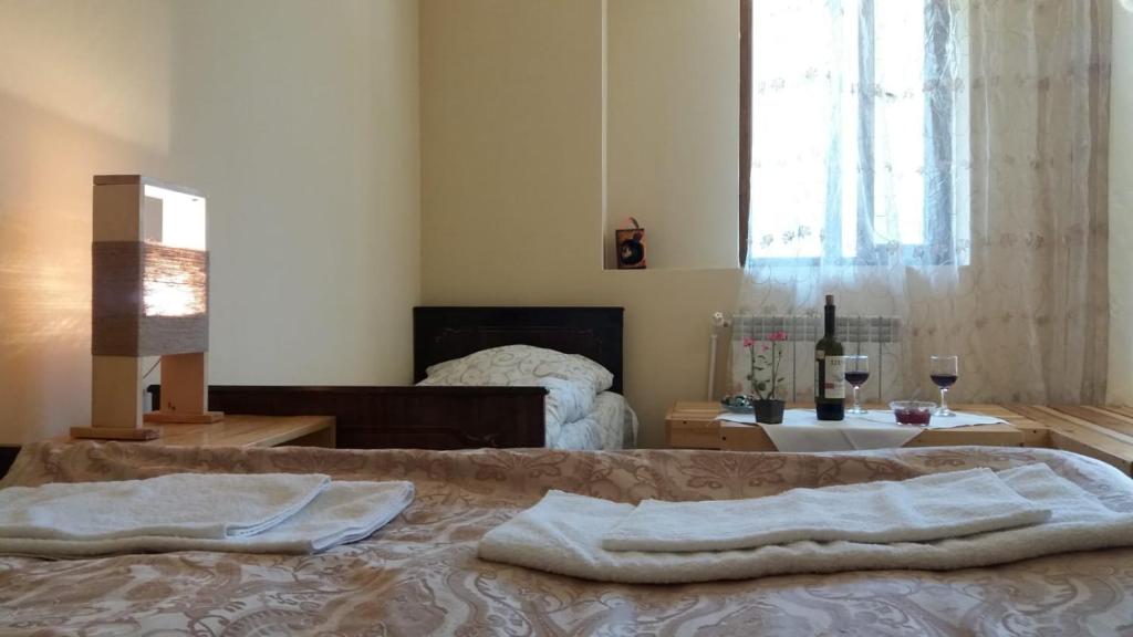 Postel nebo postele na pokoji v ubytování Arami Guest House