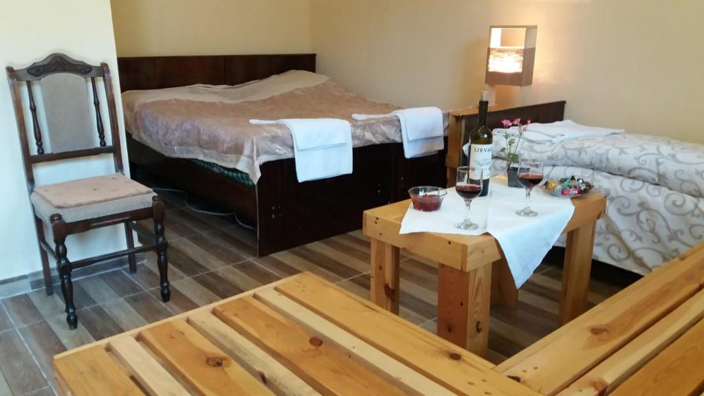 Postel nebo postele na pokoji v ubytování Arami Guest House