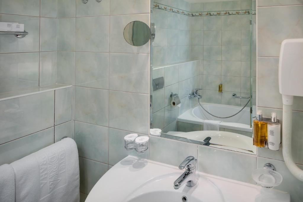 Koupelna v ubytování Adria Hotel Prague