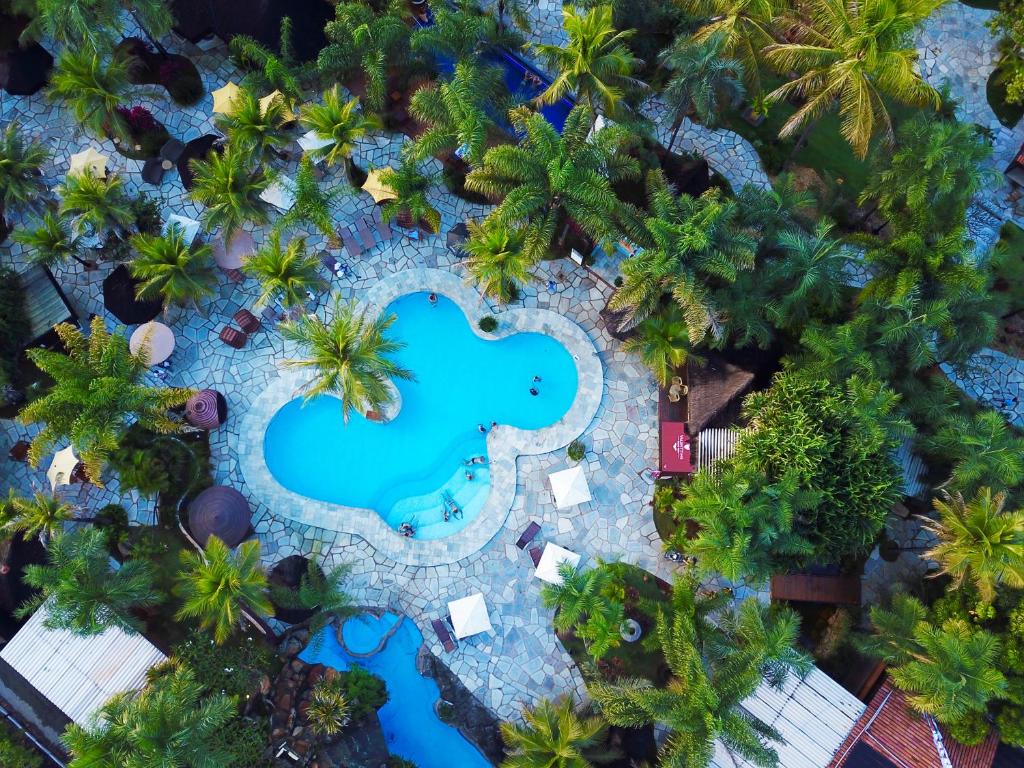 an aerial view of the pool at the resort at Pousada de Charme Villa do Comendador in Pirenópolis