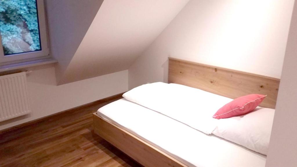Postel nebo postele na pokoji v ubytování Hotel Burgmeier