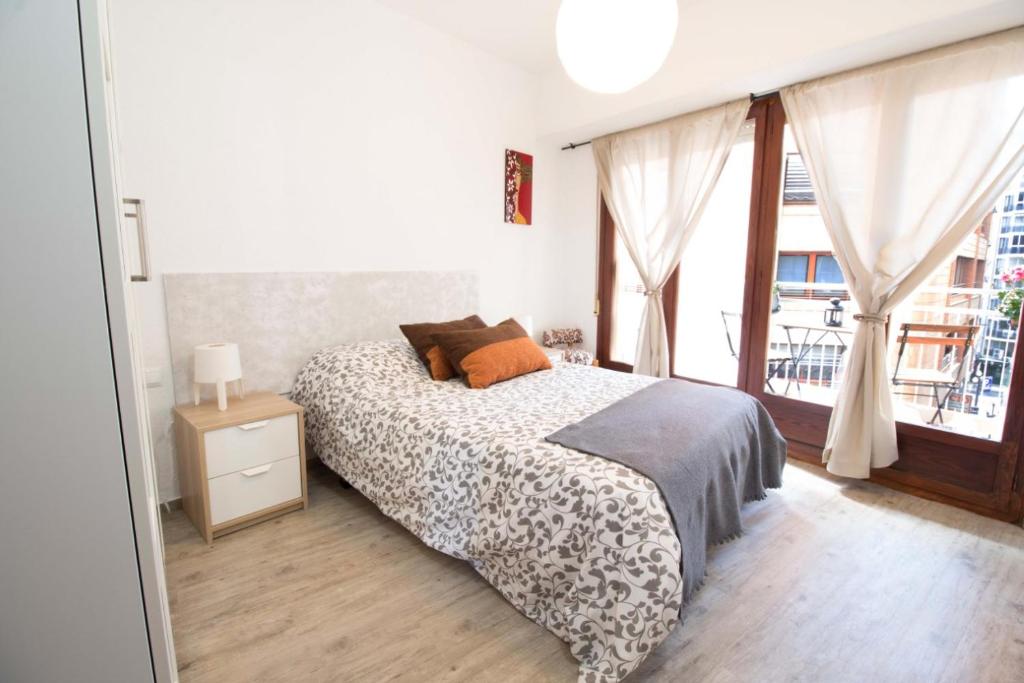 A bed or beds in a room at Apartamento Rivera#2