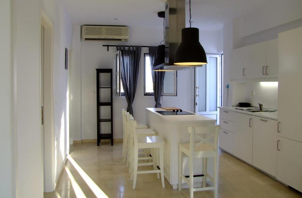 Kuchyňa alebo kuchynka v ubytovaní Helios Studios & Apartments