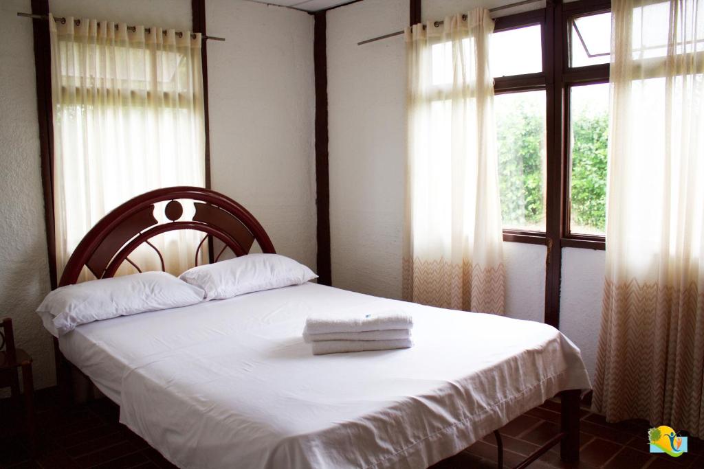 Postel nebo postele na pokoji v ubytování Hotel Campestre CENVATURS