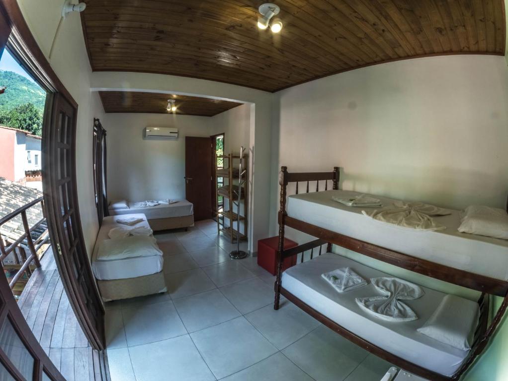 Postel nebo postele na pokoji v ubytování Biergarten Suites