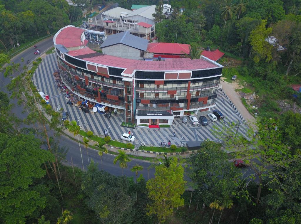 an overhead view of a building with a parking lot at Wayanad Royal Crown in Kalpetta