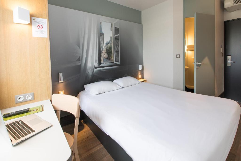 Postel nebo postele na pokoji v ubytování B&B HOTEL Lorient Caudan