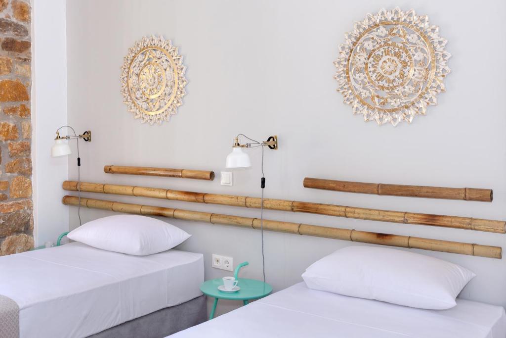 Letto o letti in una camera di Syra Suites