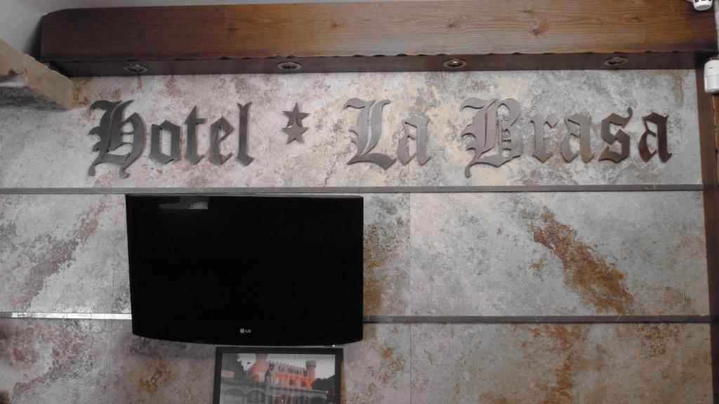 Certifikát, hodnocení, plakát nebo jiný dokument vystavený v ubytování Hotel La Brasa