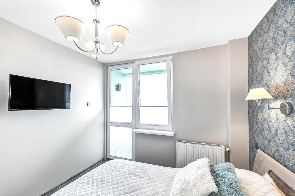 Posteľ alebo postele v izbe v ubytovaní ORION Downtown Apartment by PinPoint
