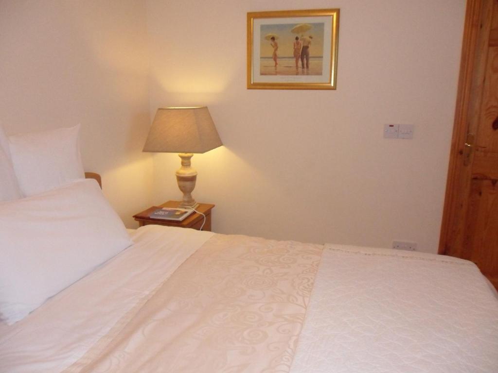Postel nebo postele na pokoji v ubytování Forest Park House B&B