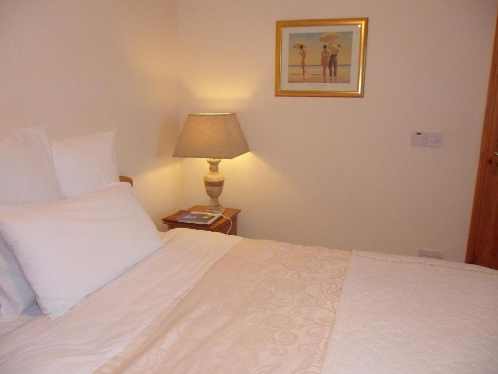 Postel nebo postele na pokoji v ubytování Forest Park House B&B