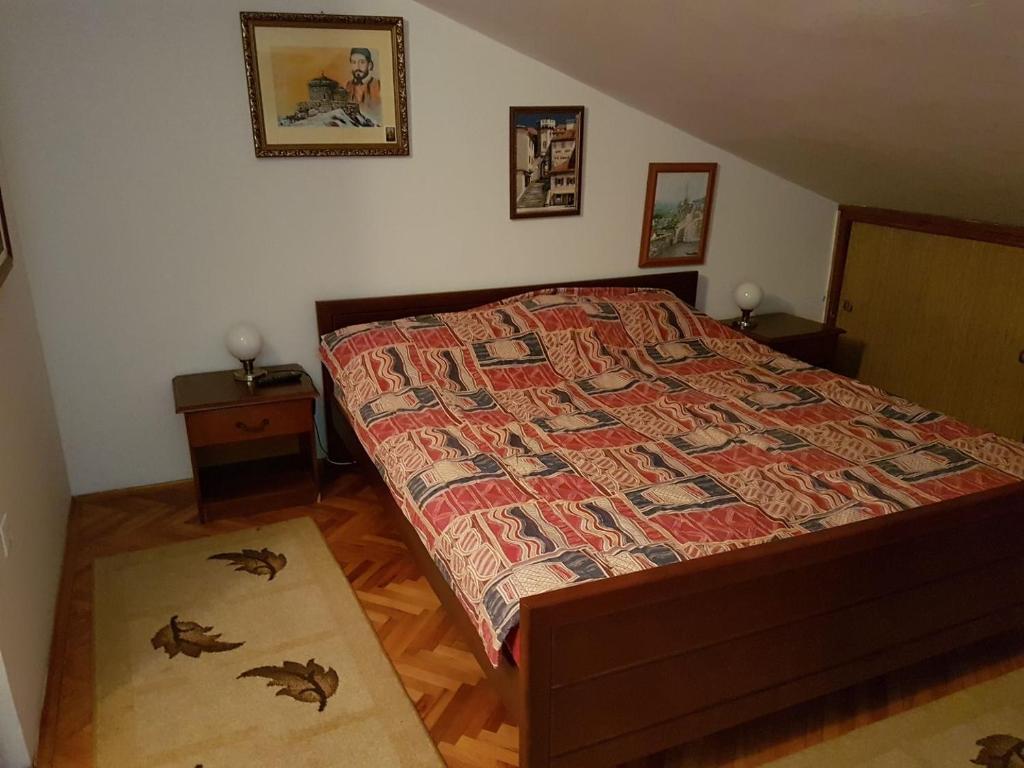 Postel nebo postele na pokoji v ubytování Duplex apartman Igalo - porodicni