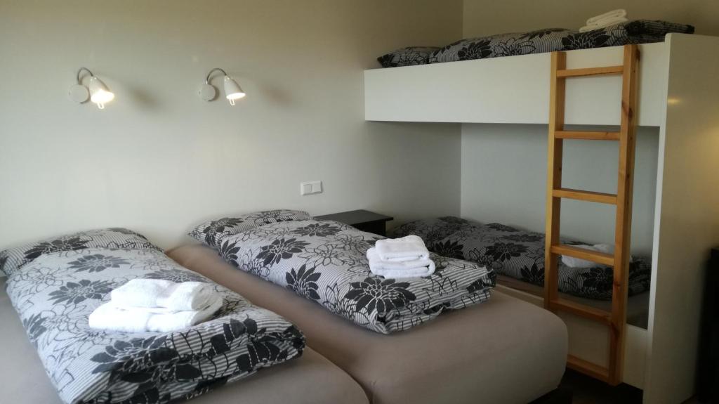 Postel nebo postele na pokoji v ubytování Guesthouse Storu-Laugar