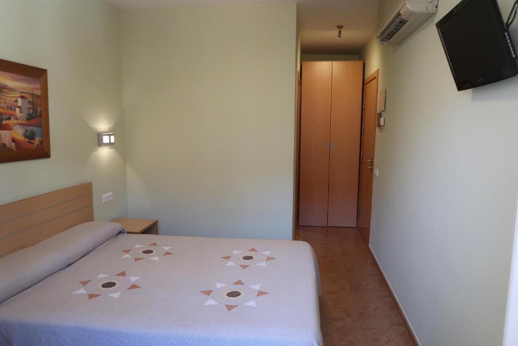 Posteľ alebo postele v izbe v ubytovaní El Camí Hotel