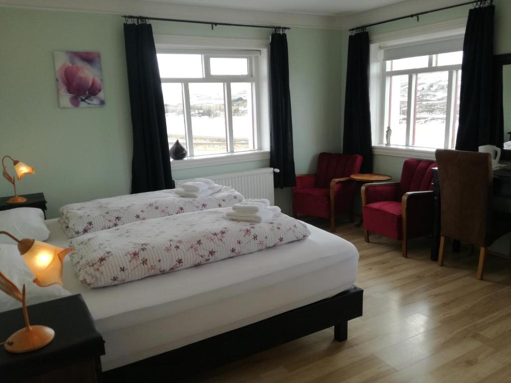 Postel nebo postele na pokoji v ubytování Guesthouse Storu-Laugar