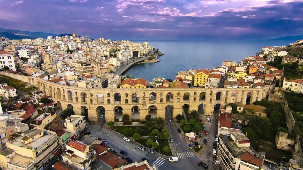 an aerial view of a city next to the ocean at Giorgos-Vera in Kavála
