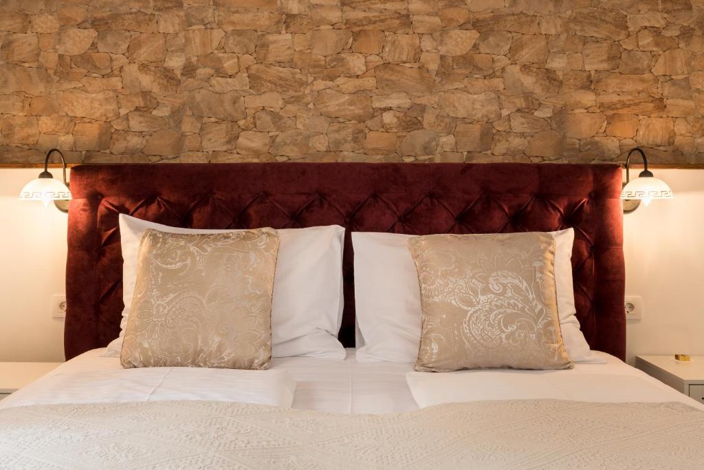 Postel nebo postele na pokoji v ubytování Guesthouse Imperator
