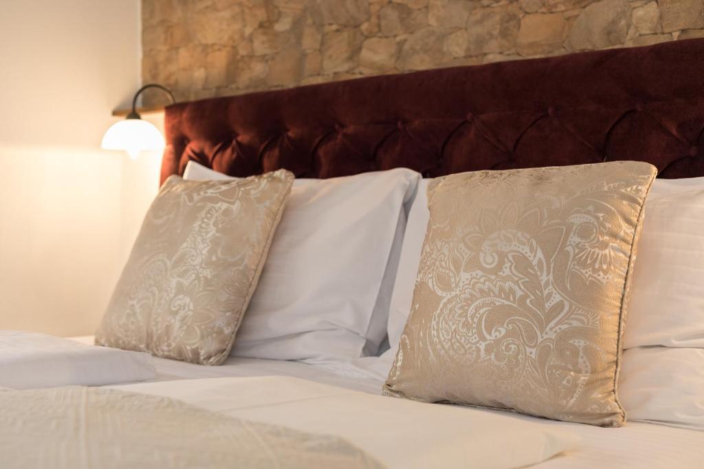 Postel nebo postele na pokoji v ubytování Guesthouse Imperator